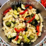 pasta with seasonal vegetables in a pot