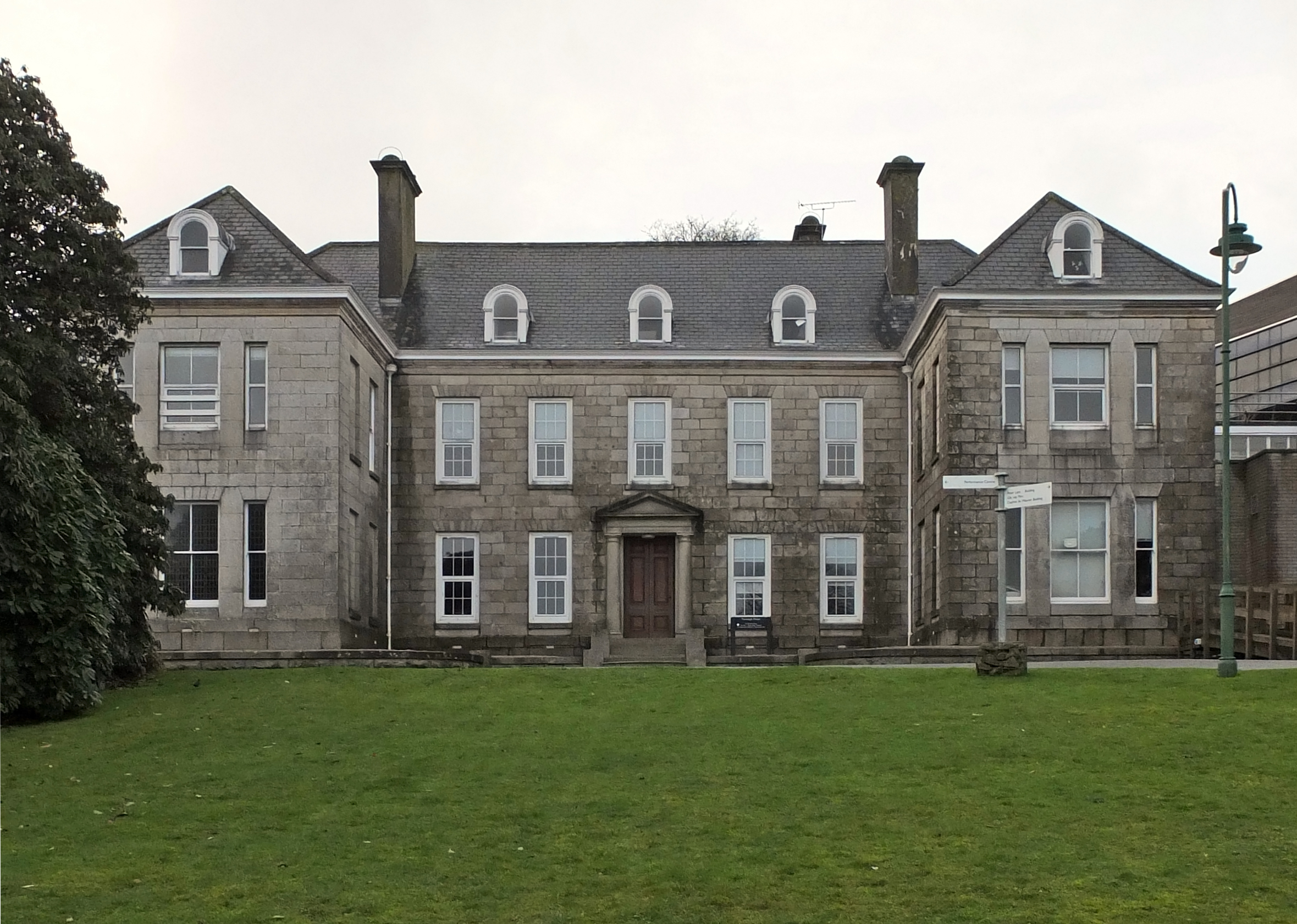 Tremough House - an imposing double fronted mansion made of granite.