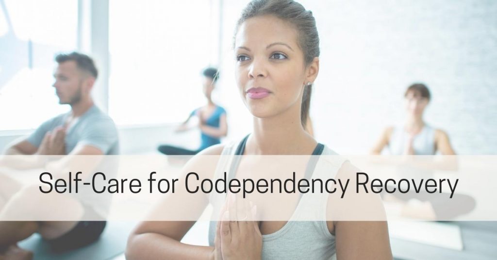 woman in yoga class. Text says "self-care for codependency recovery."