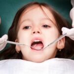 child having dental exam