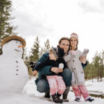 mom with children and snowman
