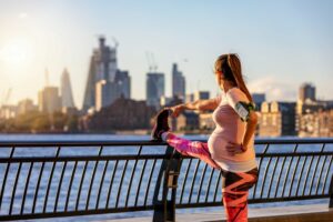 pregnancy exercise woman stretching in london