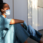 Tired,Exhausted,Female,African,Scrub,Nurse,Wears,Face,Mask,Blue