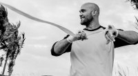 MMA Fighter Robbie Lawler wrapping his hands outdoors