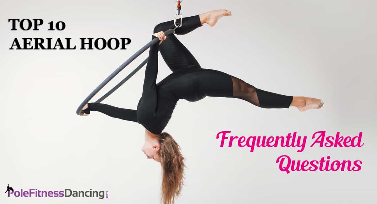 a hoop dancer doing an aerial hoop pose on aerial lyra hoop
