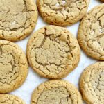 chewy peanut butter cookies on white parchment