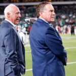 Former Patriots coach Bill Belichick (right), who's now an ESPN analyst, watches warmups with Eagles owner Jeffrey Lurie before Monday's game against the Falcons.