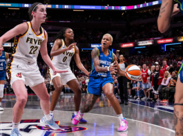 Lynx guard Courtney Williams, right, yells while running a play during a Sept. 6 game between the Indiana Fever and the Lynx at Gainbride Fieldhouse in Indianapolis.