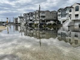 Flooding at midday high tide on Saturday at 57th Street and Sounds Avenue near the bay in Sea Isle City.