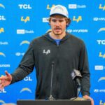 Chargers' Jim Harbaugh won't speculate on Justin Herbert injury