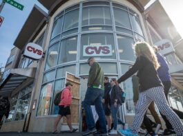 Woonsocket-based CVS Health will lay off about 2,900 office workers amid pressure from investors to improve its financial performance.