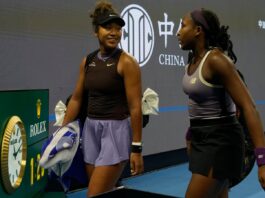 Coco Gauff carries Naomi Osaka's bags off court after the Japanese star retired injured from their match in Beijing | Tennis News